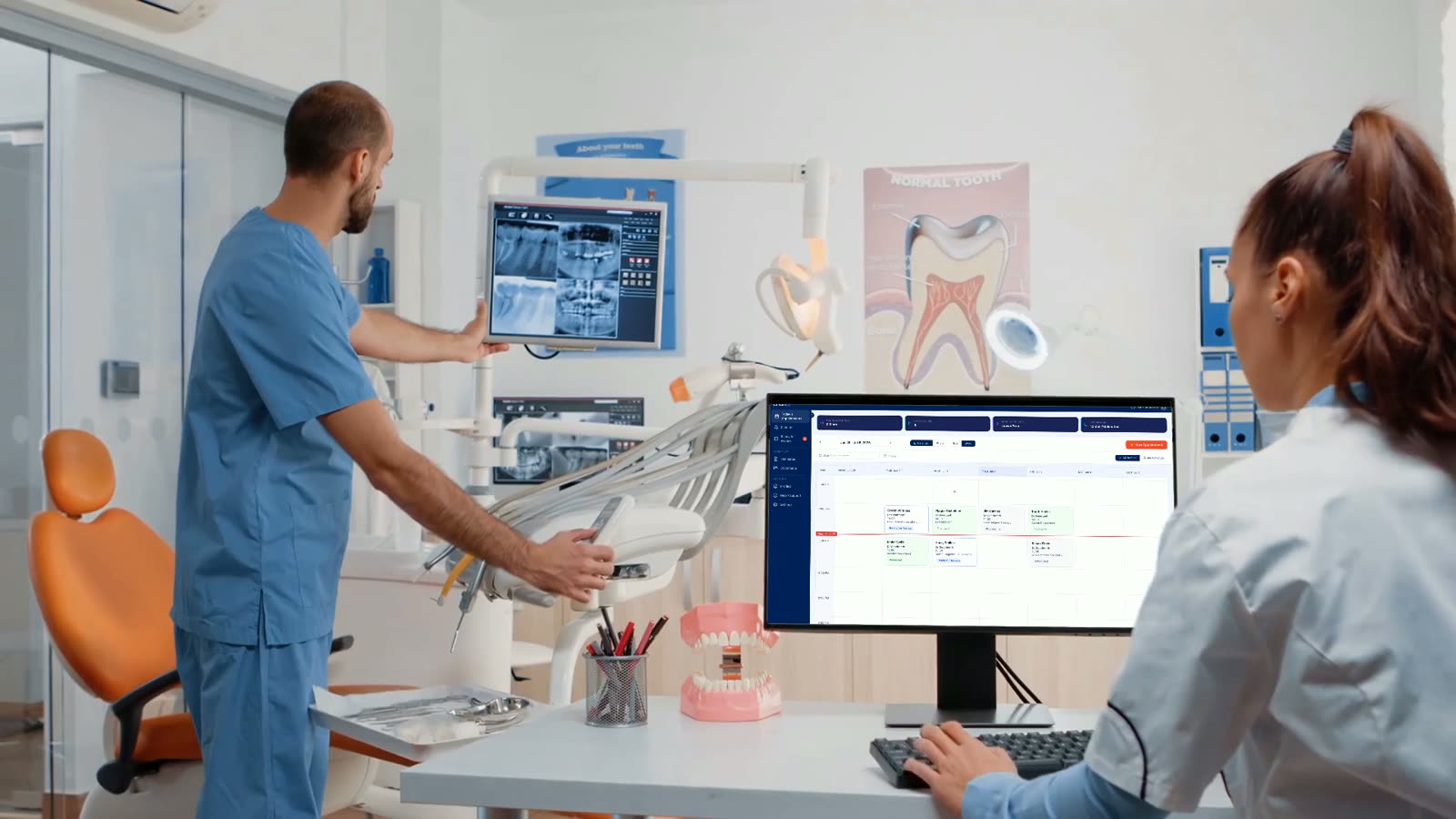 A dental practice team working between the operatory and the practice management system